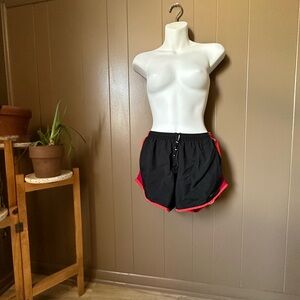 NIKE red lining athletic shorts